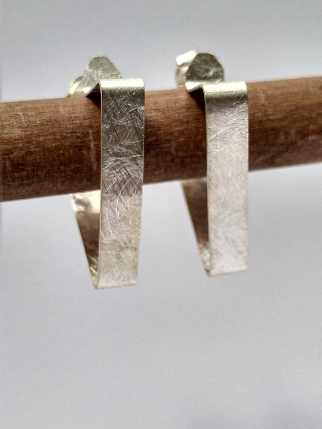 Pendientes Folium Triángulos