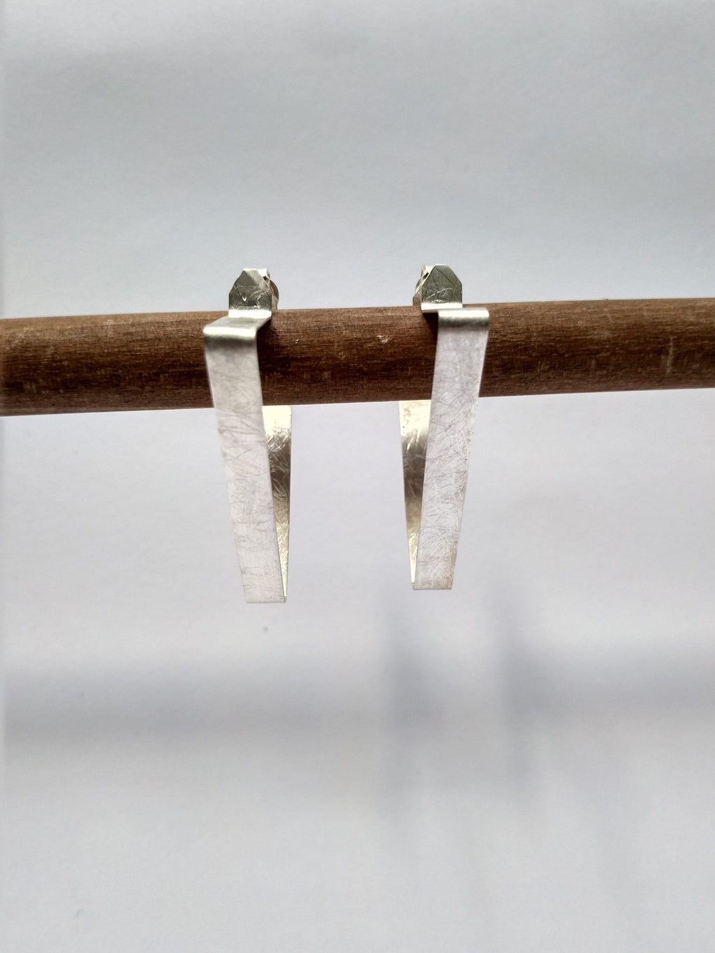 Pendientes Folium Triángulos finos